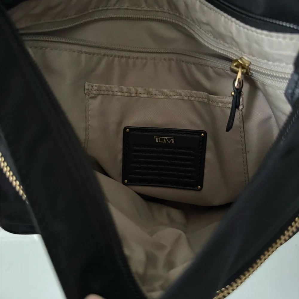 Tumi Sadler Black Crossbody Bag with Gold Accents EC - Picture 4 of 7